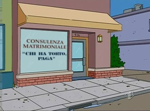Scena animata raffigurante la facciata di un ufficio con la scritta ironica sulla vetrina: «Consulenza Matrimoniale - "Chi ha torto, paga"».